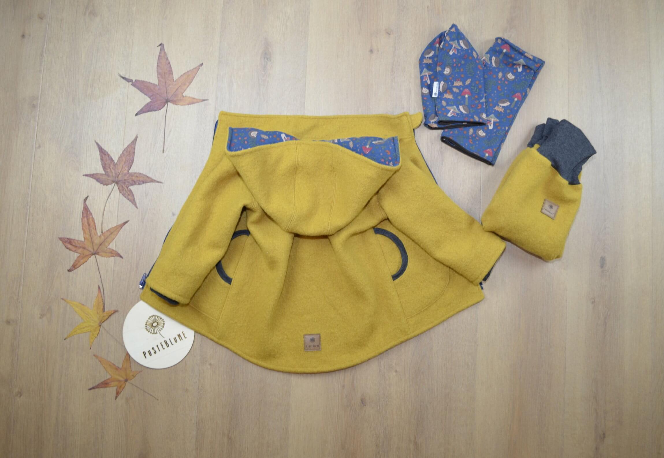 Walkjacke und Walkhose in senfgelb mit Loop und Haube