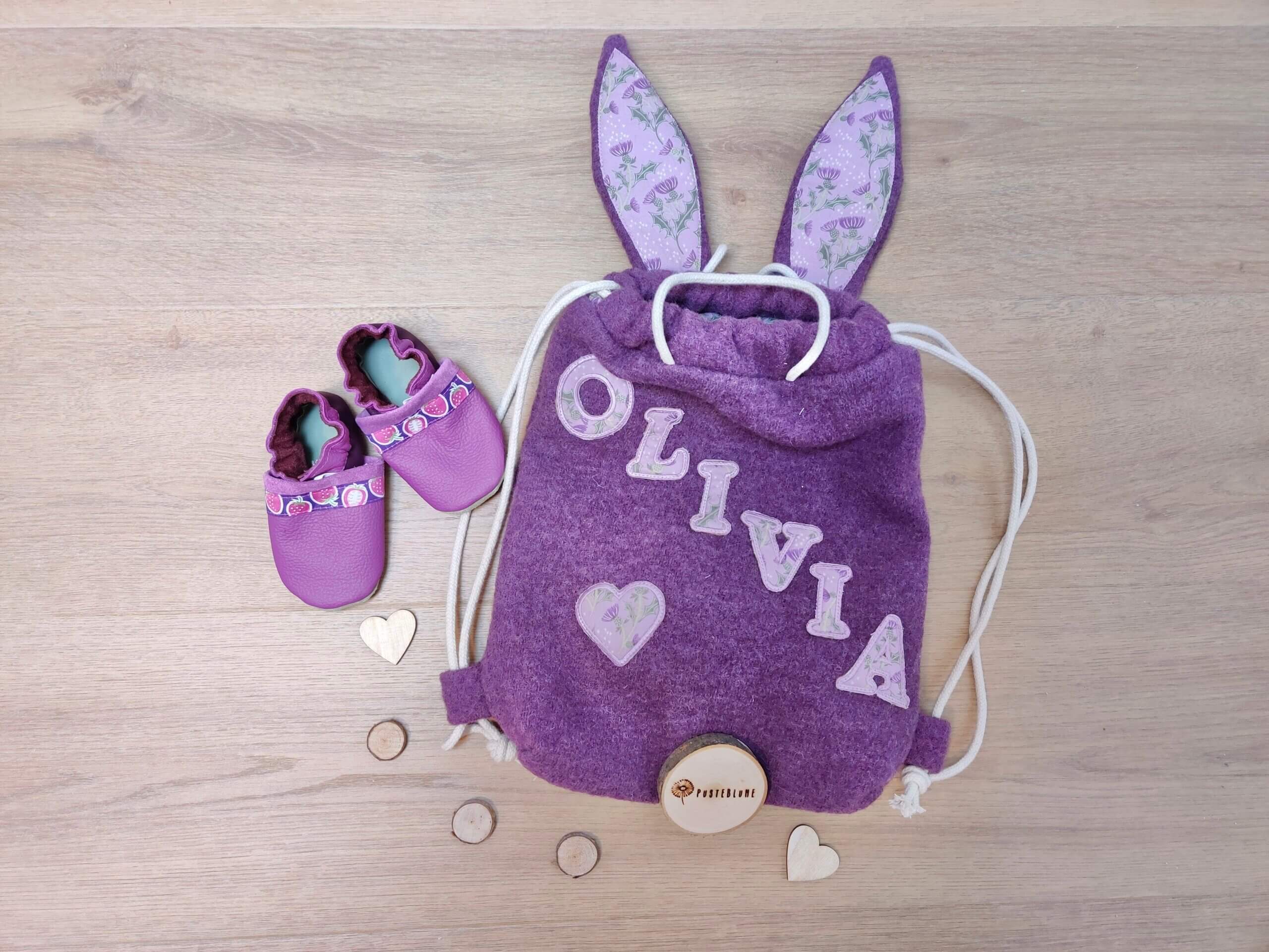 Walkrucksack mit Ohren in lila und Kordel zum Umhängen