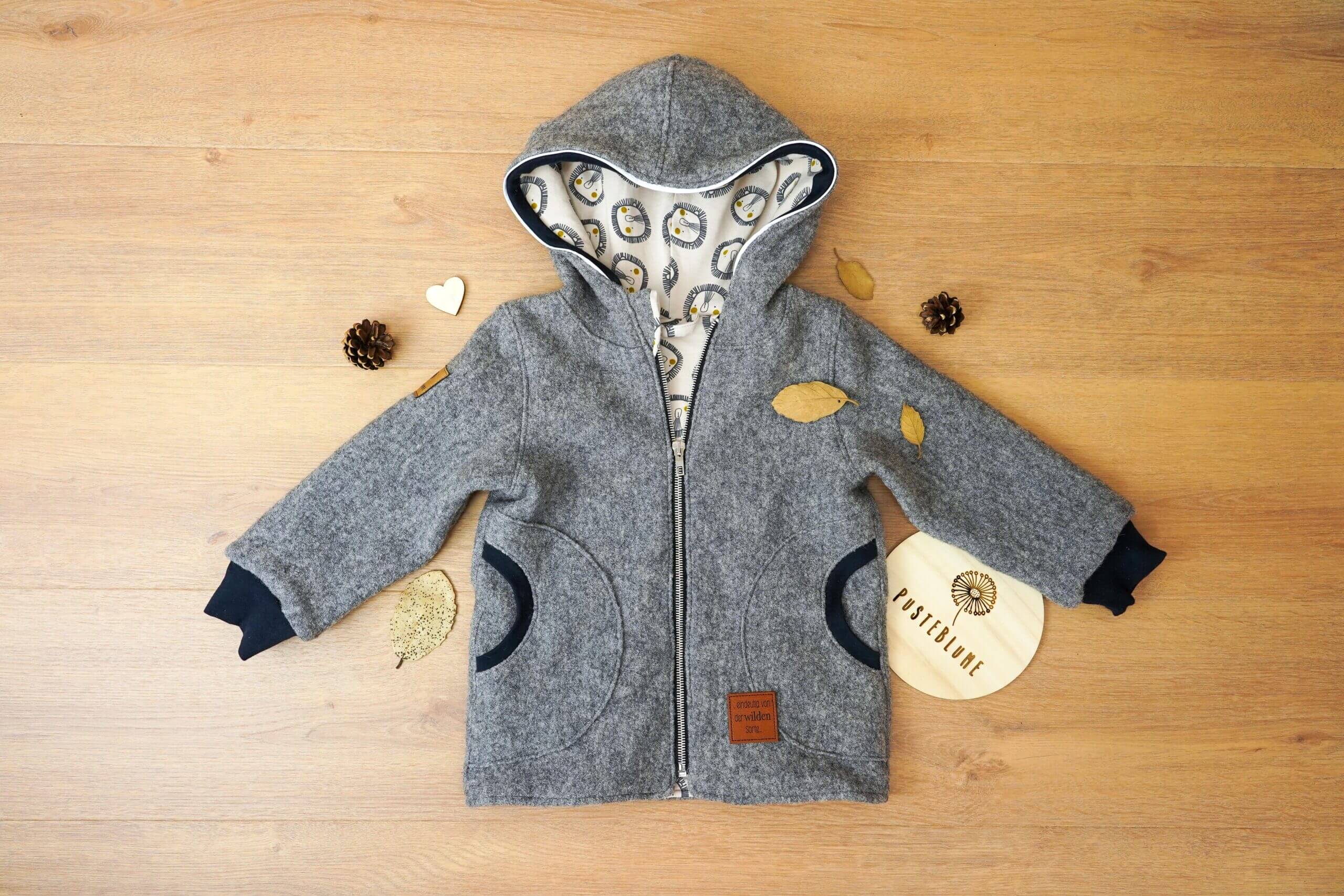 Walkjacke in grau mit Jersey mit Löwenmotiv gefüttert