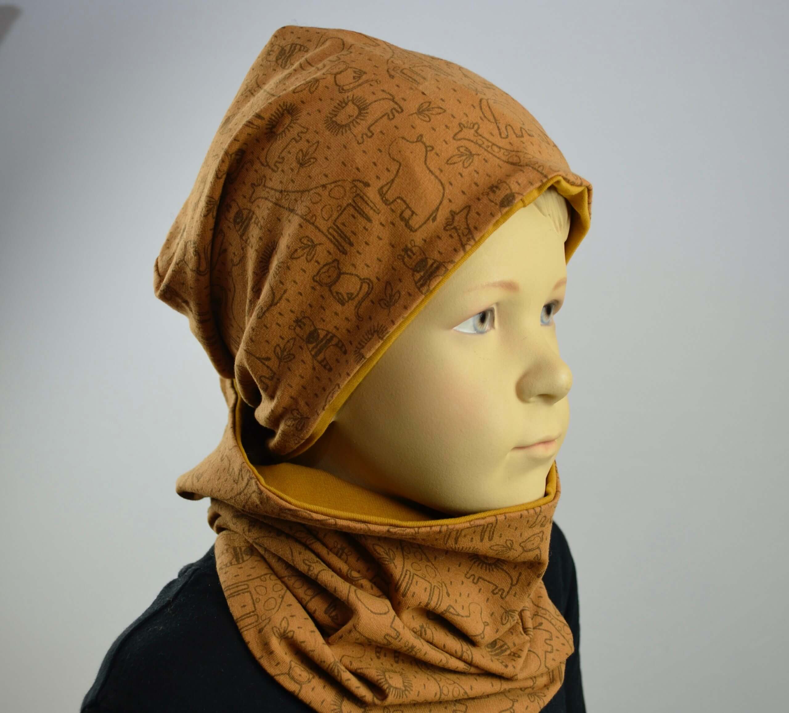 Tragefoto - Jerseyhaube und Loop, Safaritiere
